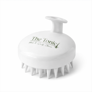 White scalp massager with green branding